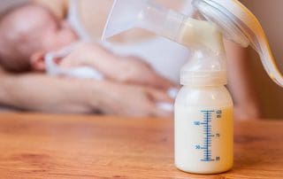 baby with pumped milk breastmilk nutrition