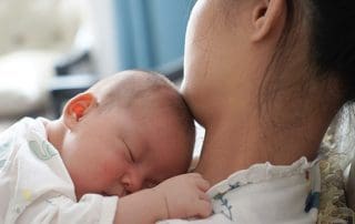 new mother bonding with baby