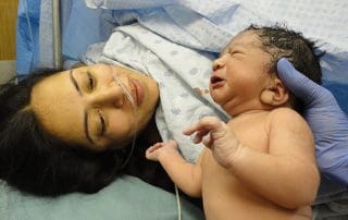 woman and baby after c-section