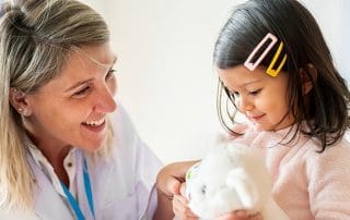 Pediatrician with baby