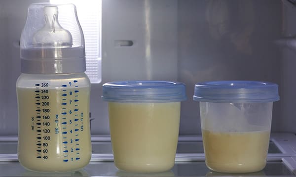 three containers of mother's milk hand expressed