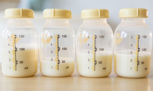half filled bottles of high lipase milk