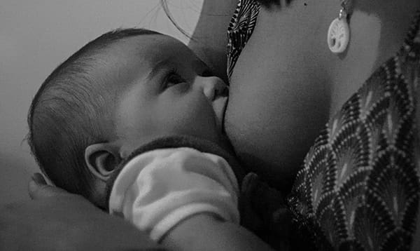 Woman breastfeeding her baby