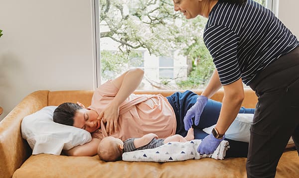 woman at a lactation consultant appointment with Breastfeeding Success