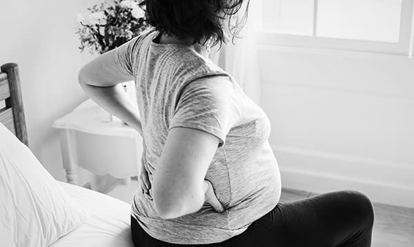 woman in early labor with back labor