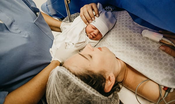 mother after giving birth via cesarean