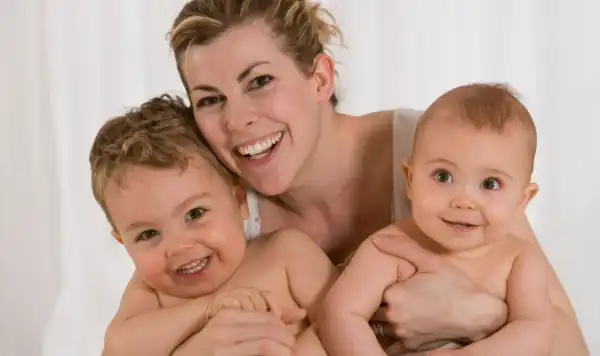 A tandem nursing mother.